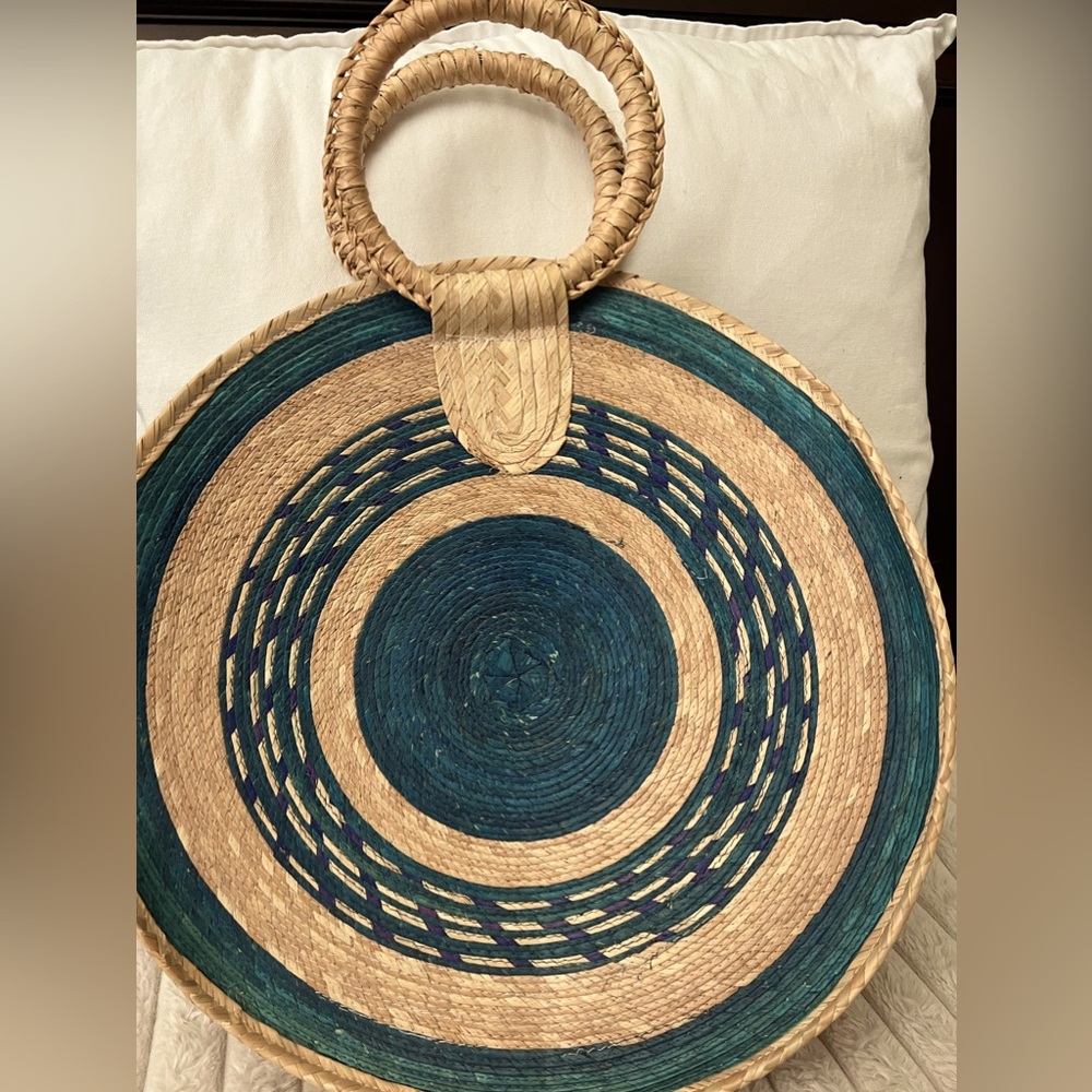 Woven straw circle purse with turquoise